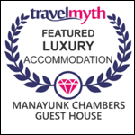 Logo indicating Manayunk Chambers Guest House as a featured luxury accommodation by Travel Myth.